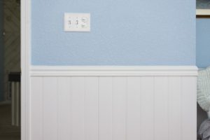 Wainscoting in The Corner of Wall with Knockdown Texture Finish